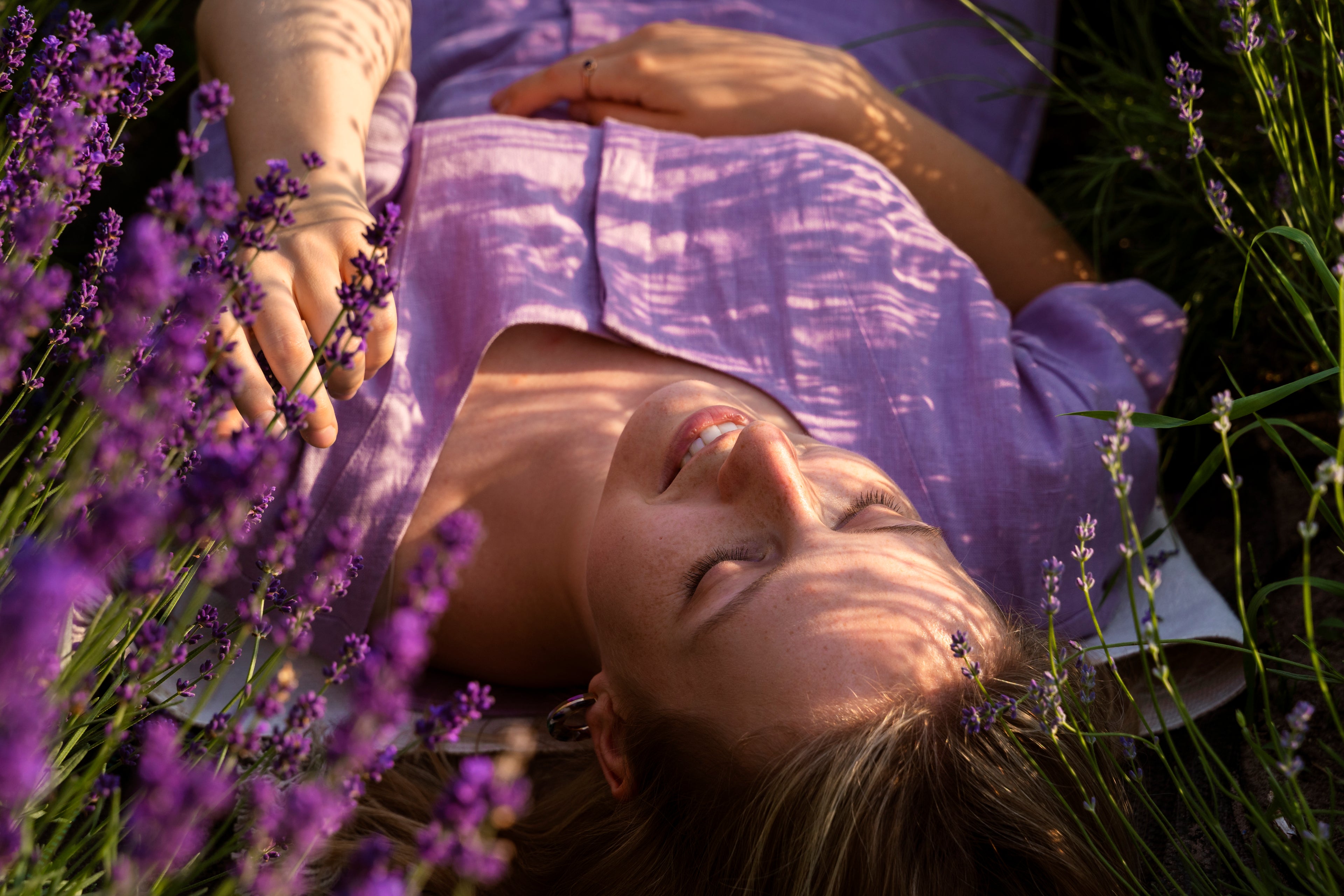 "Serene woman lavender field aromatherapy natural wellness Wild Well"